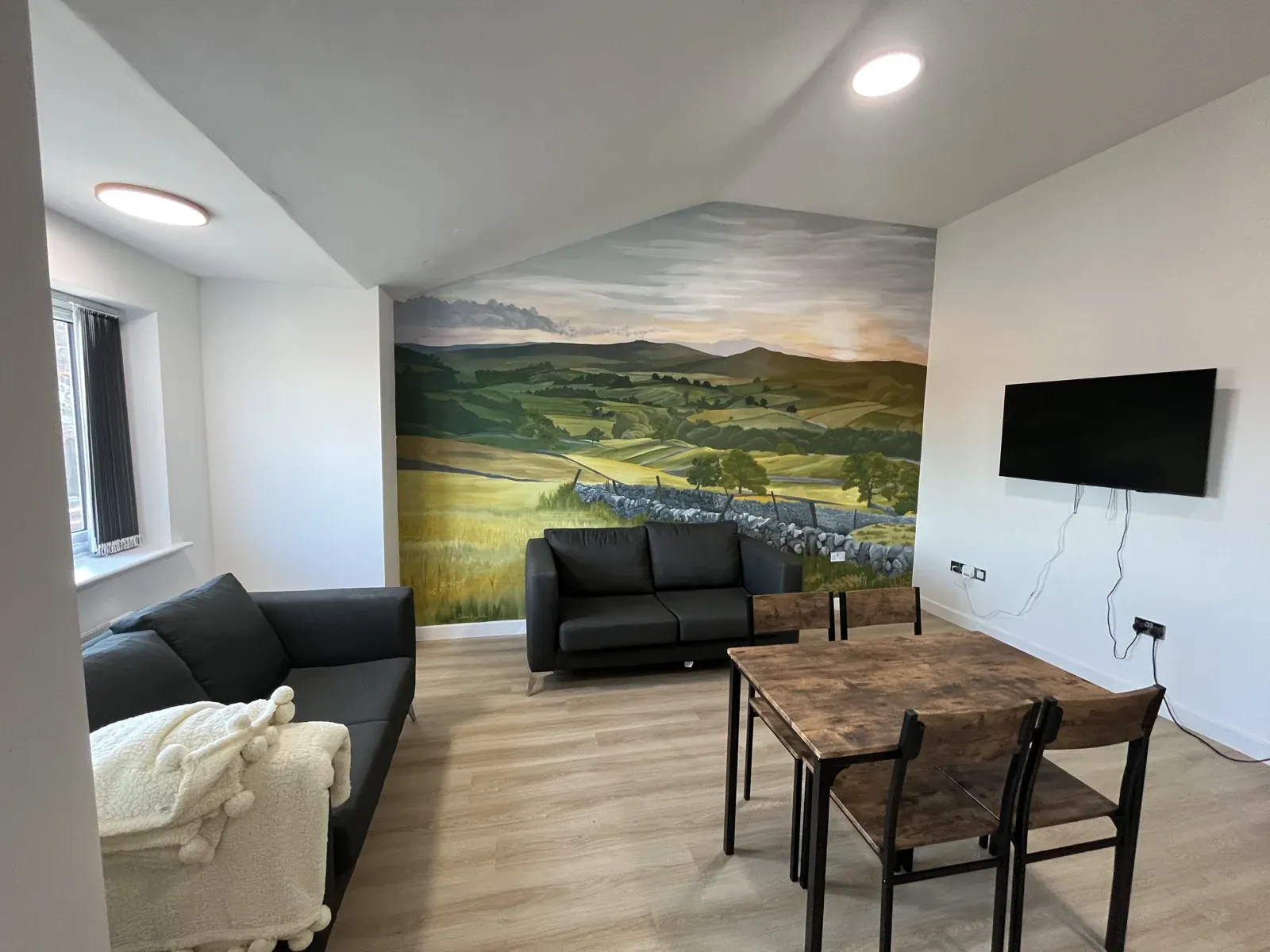 Countryside mural in its room