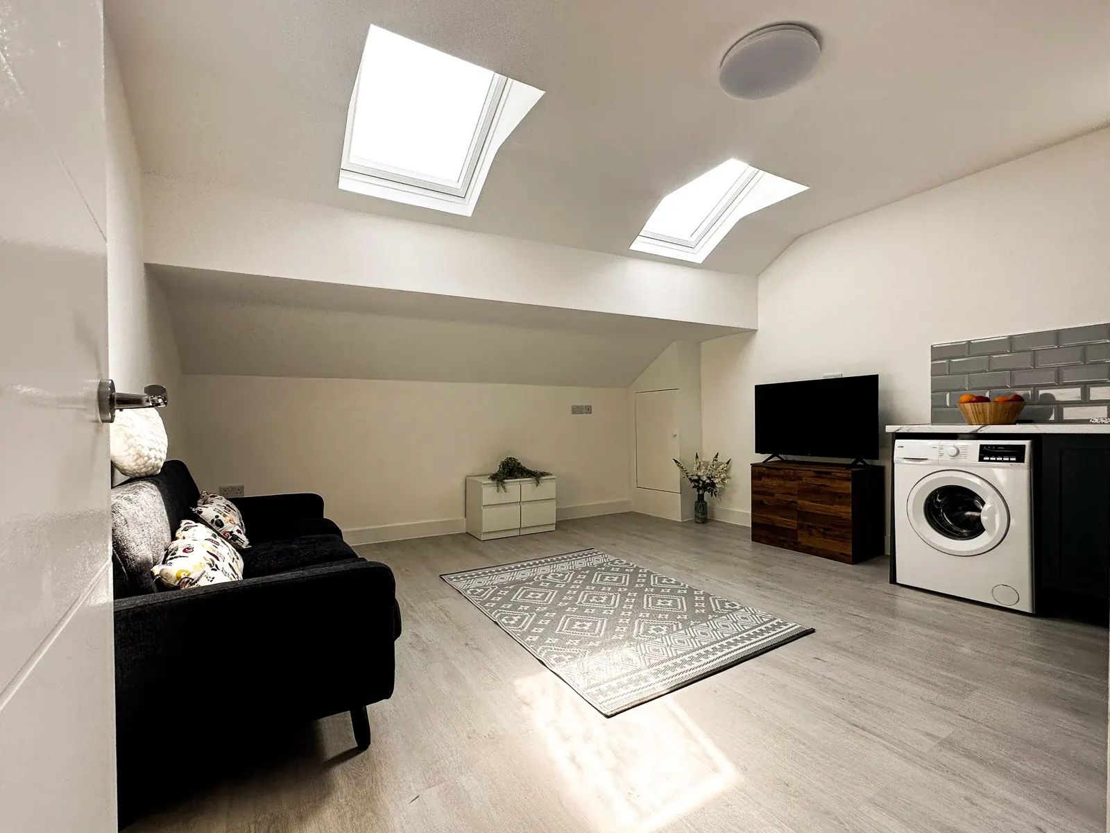 Loft living space and fitted kitchen