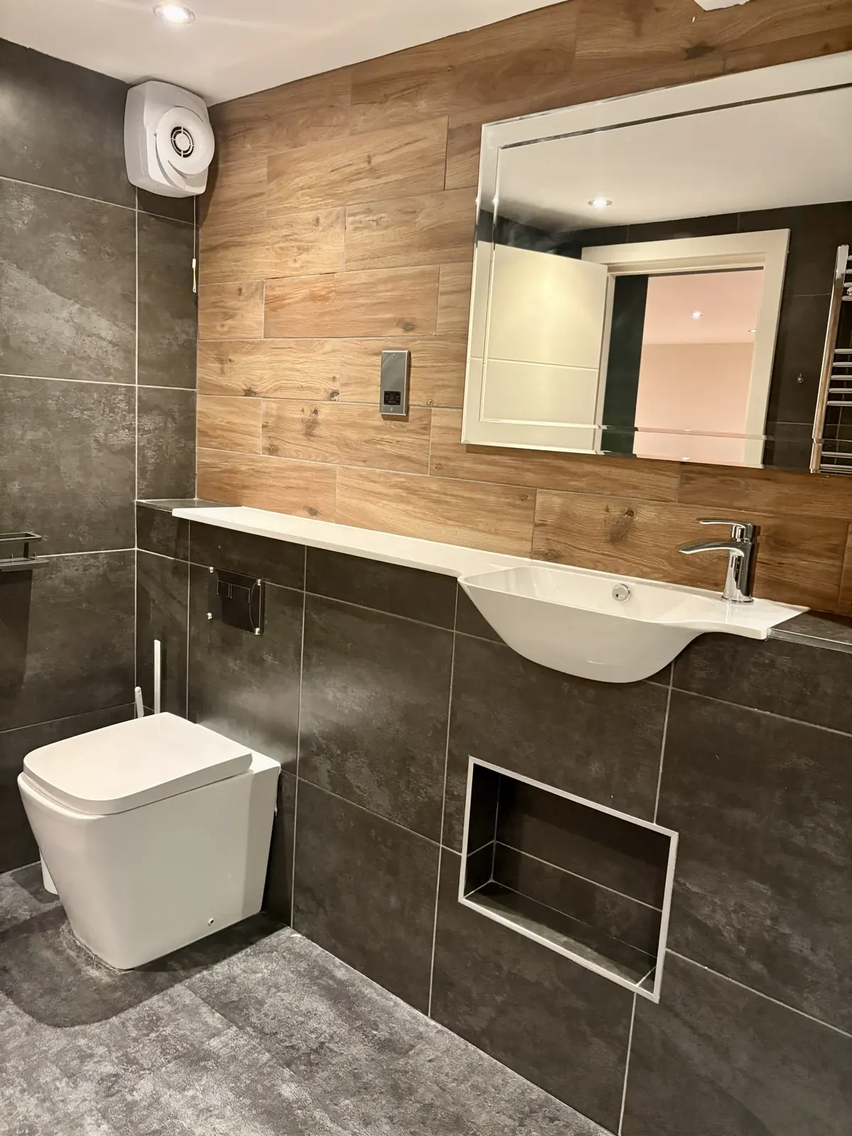 Basin and wood-effect bathroom finish