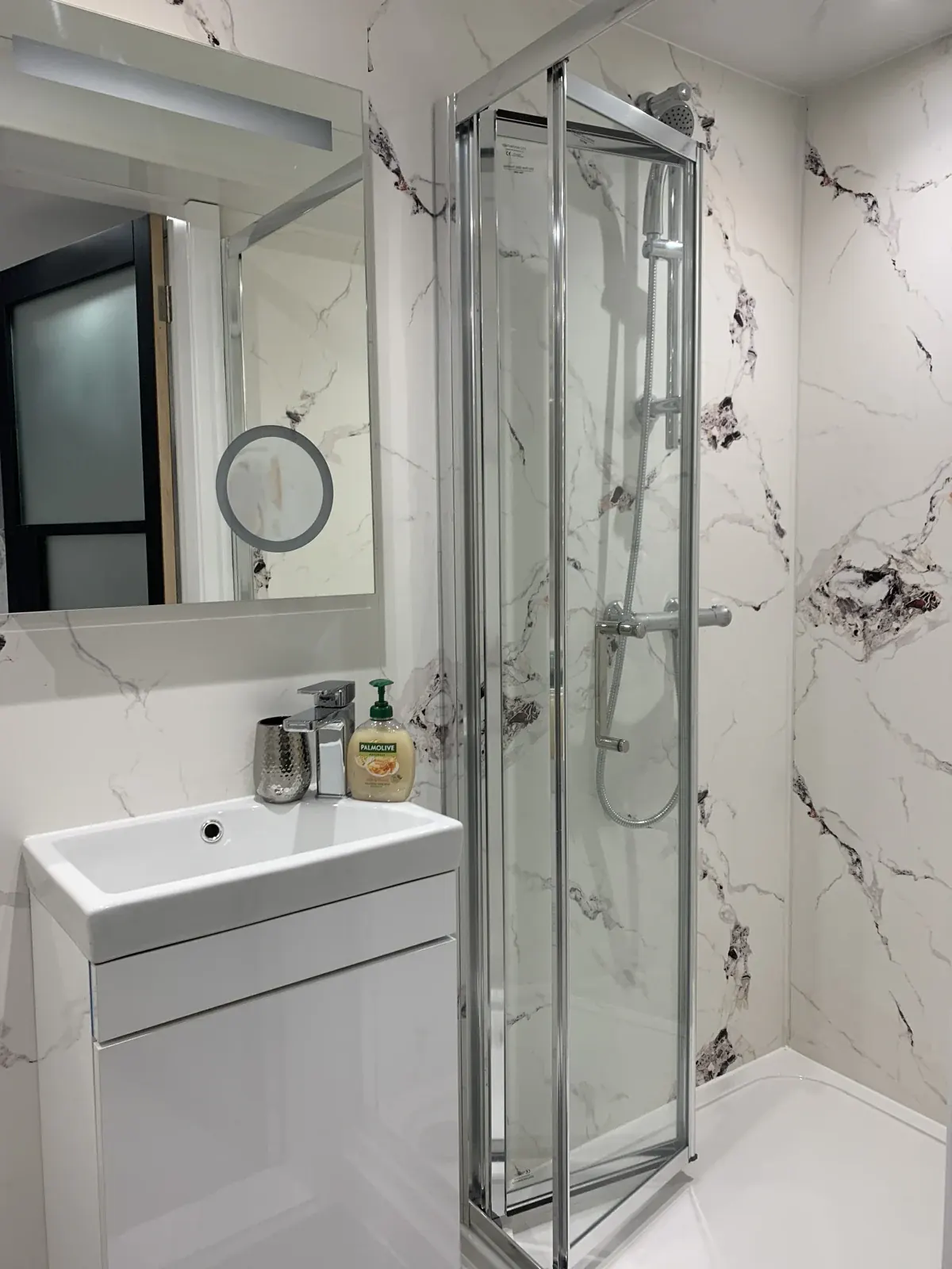 Compact shower and vanity
