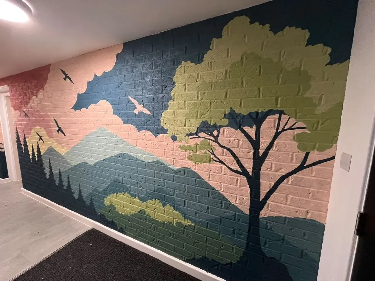 A landscape painted along the hallway
