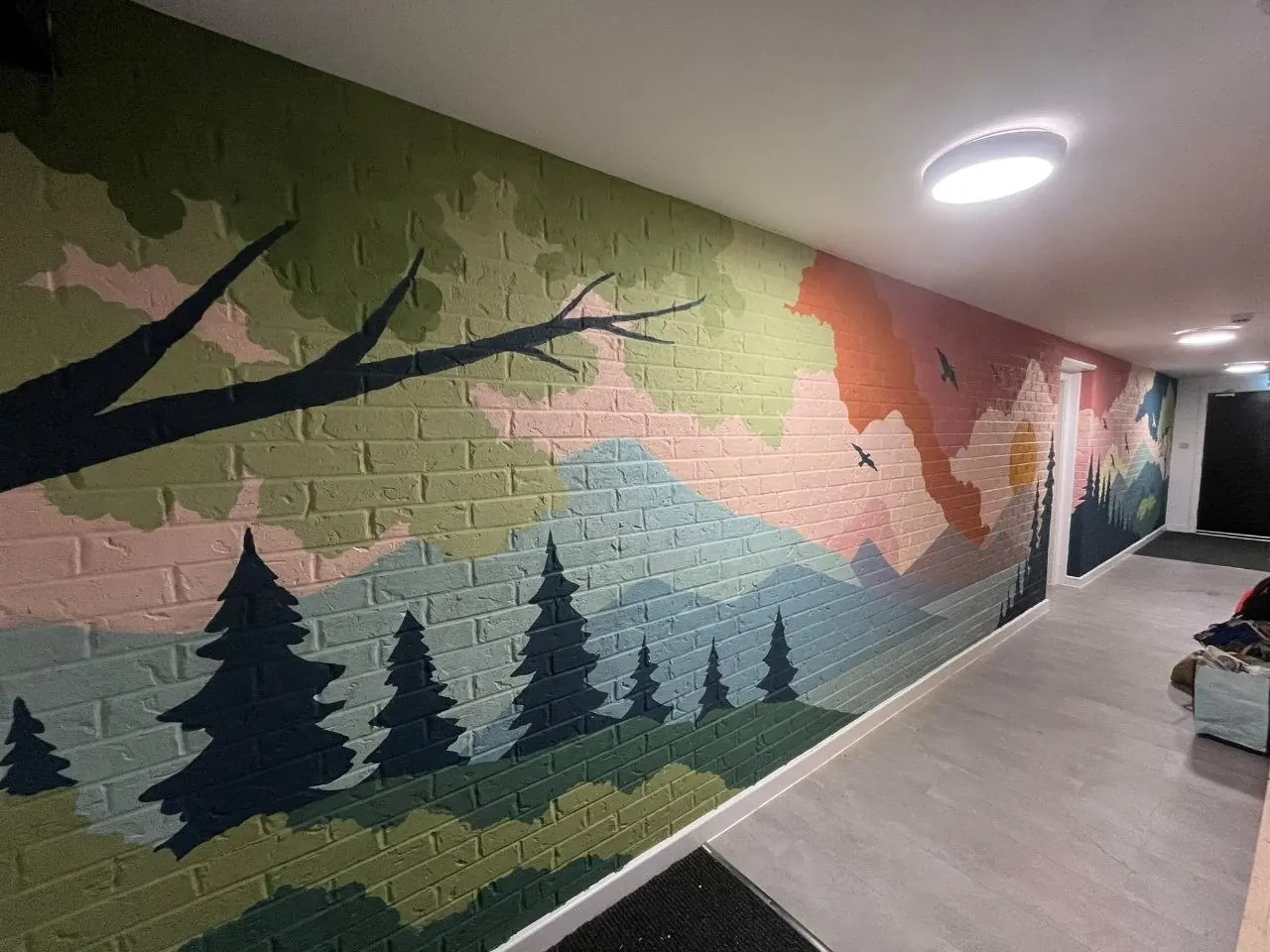 The mural along the corridor
