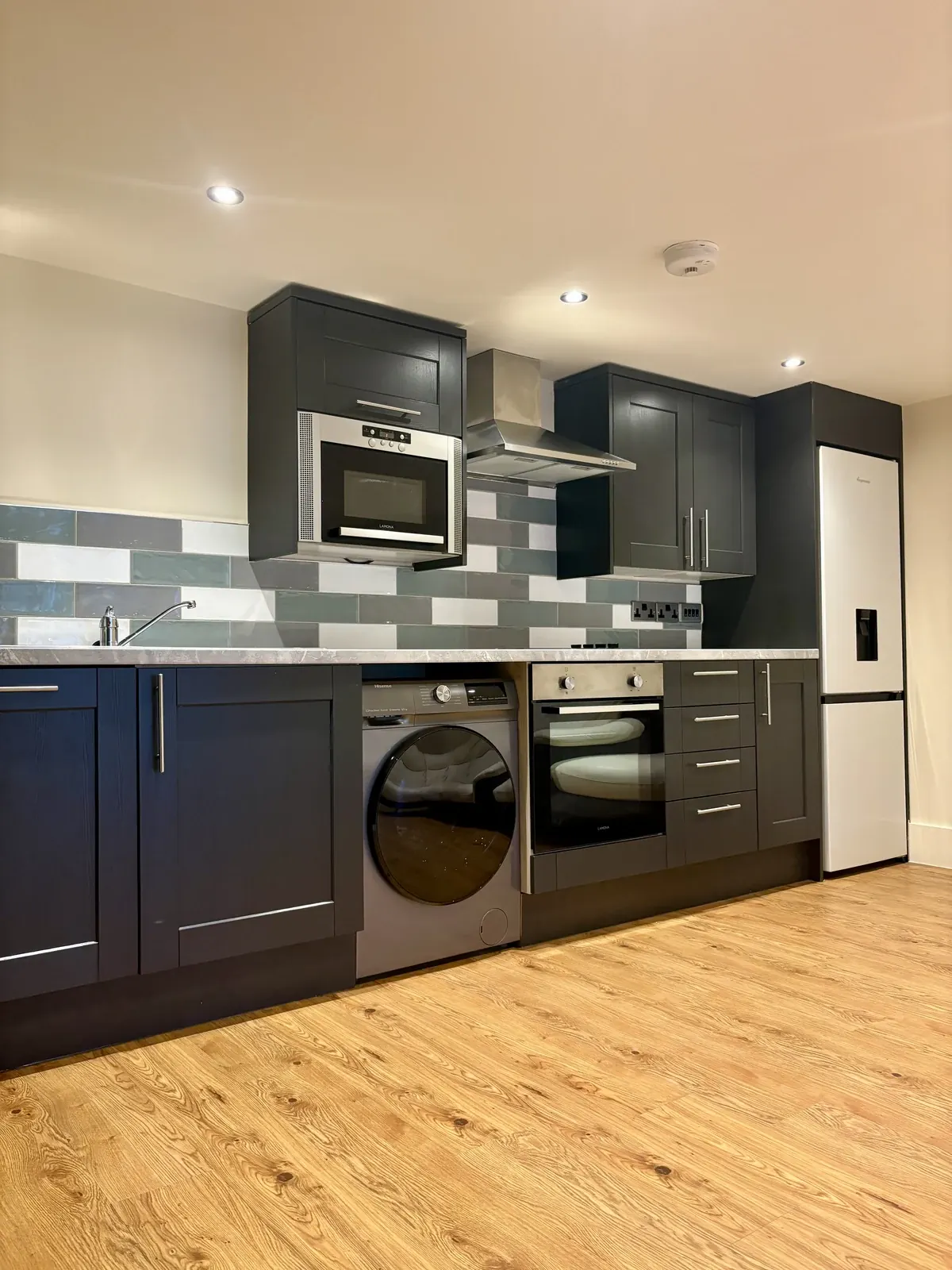 The fitted apartment kitchen