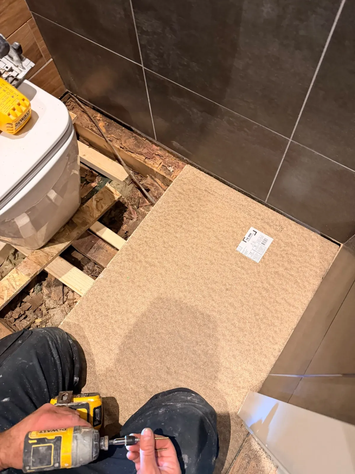 Bathroom floor repair in progress